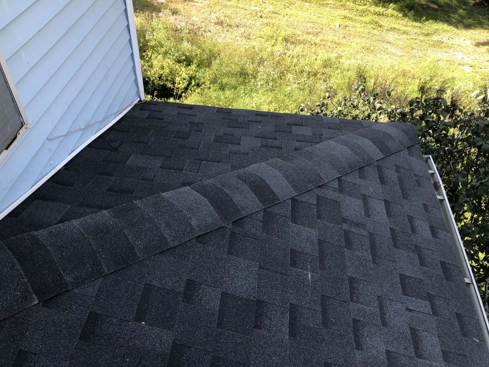 Slide of The Pioneer Roofing Company