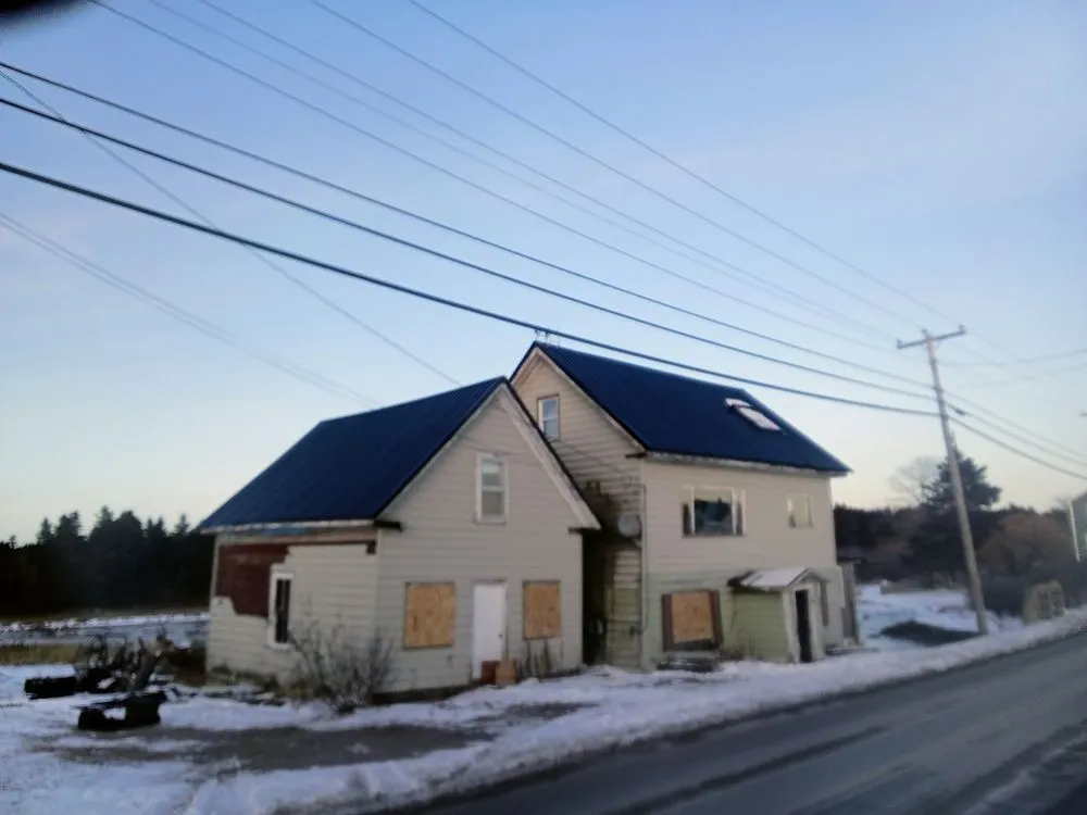 Slide of The Pioneer Roofing Company