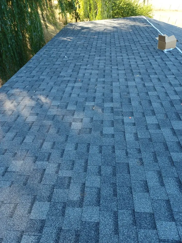 Slide of The Price Is Right Roofing