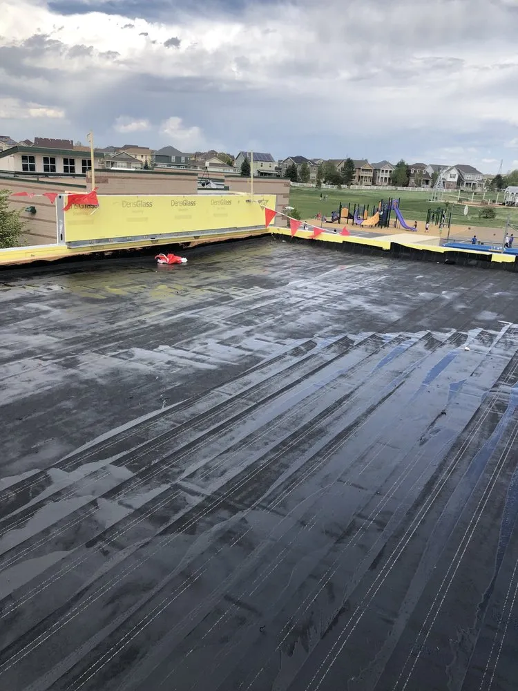 Slide of The Ramos Roofing Company