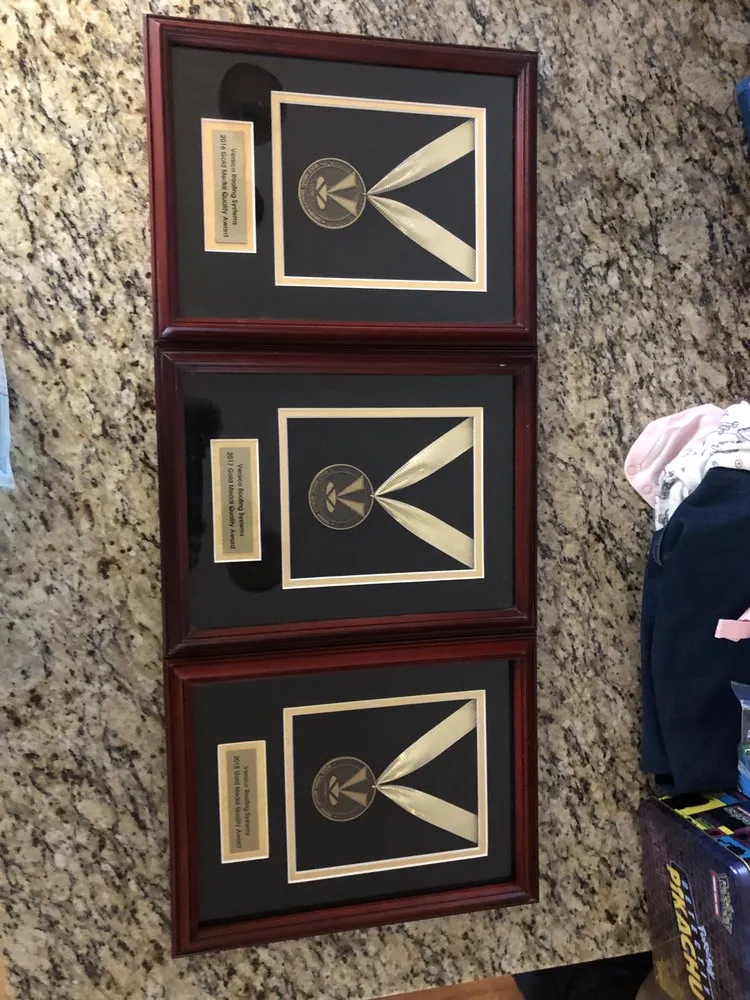 Slide of The Ramos Roofing Company