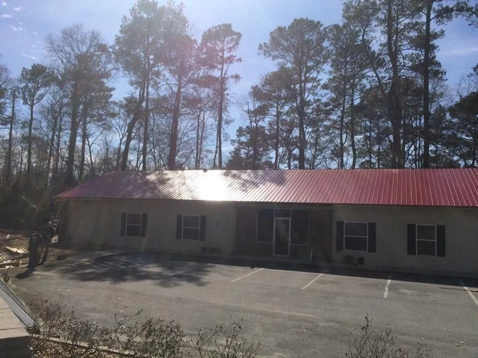 Emergency roof leak repair after storm damage in Bonaire, GA by The Real Middle Georgia Roofing and Construction