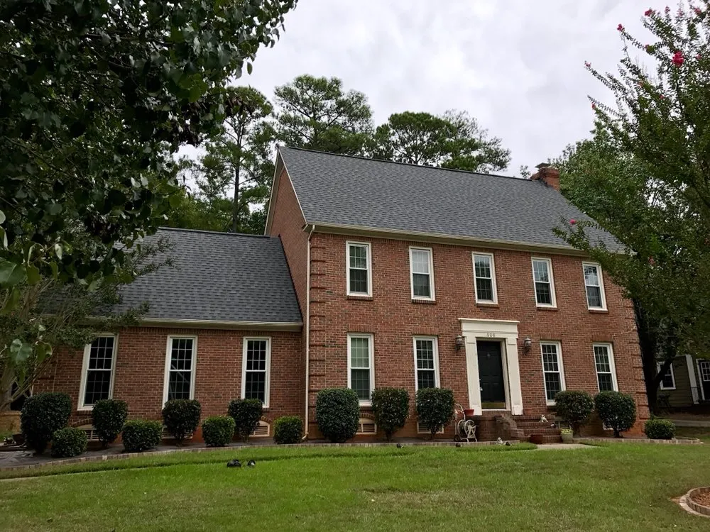 Slide of The Red Shirt Guys Roofing