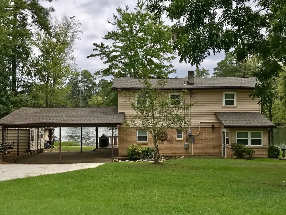 Slide of The Red Shirt Guys Roofing