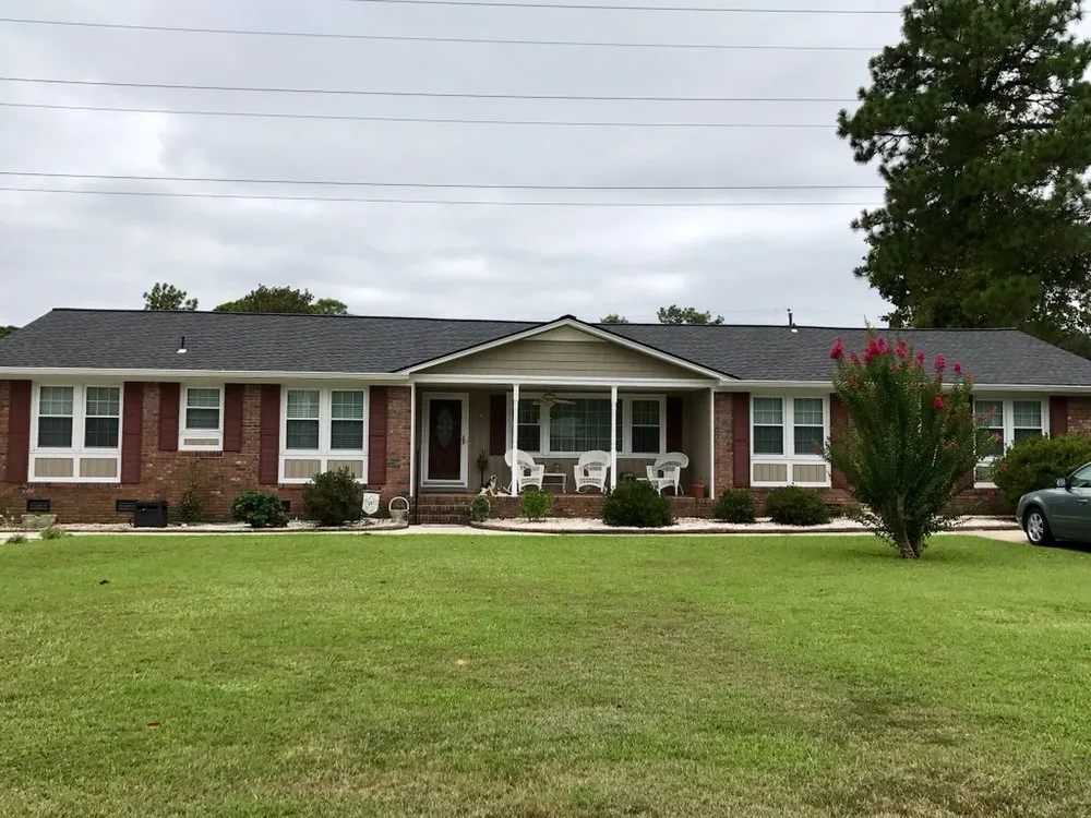Slide of The Red Shirt Guys Roofing