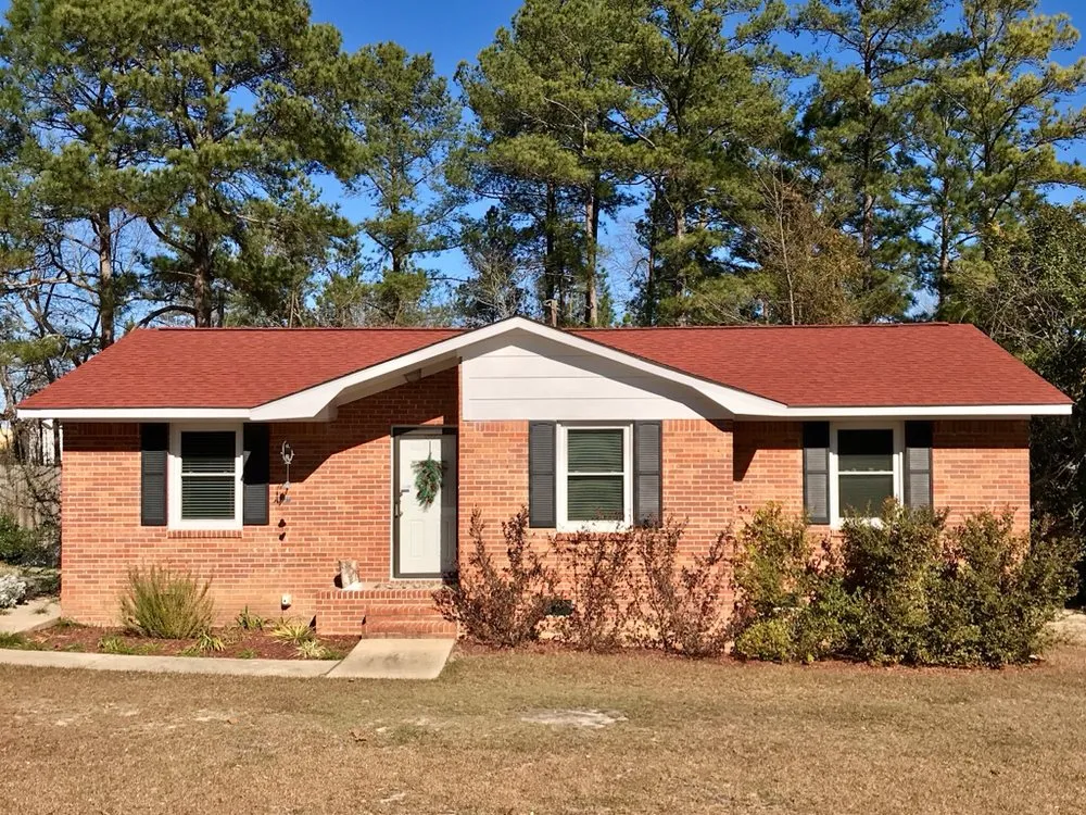 Slide of The Red Shirt Guys Roofing