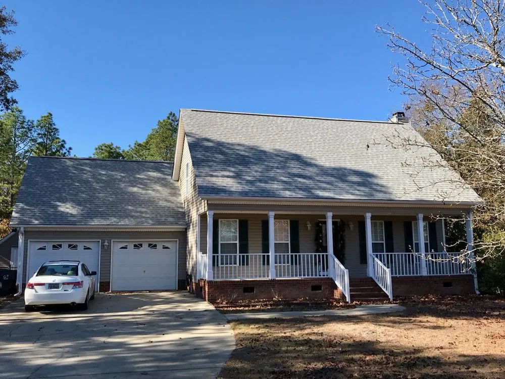 Slide of The Red Shirt Guys Roofing