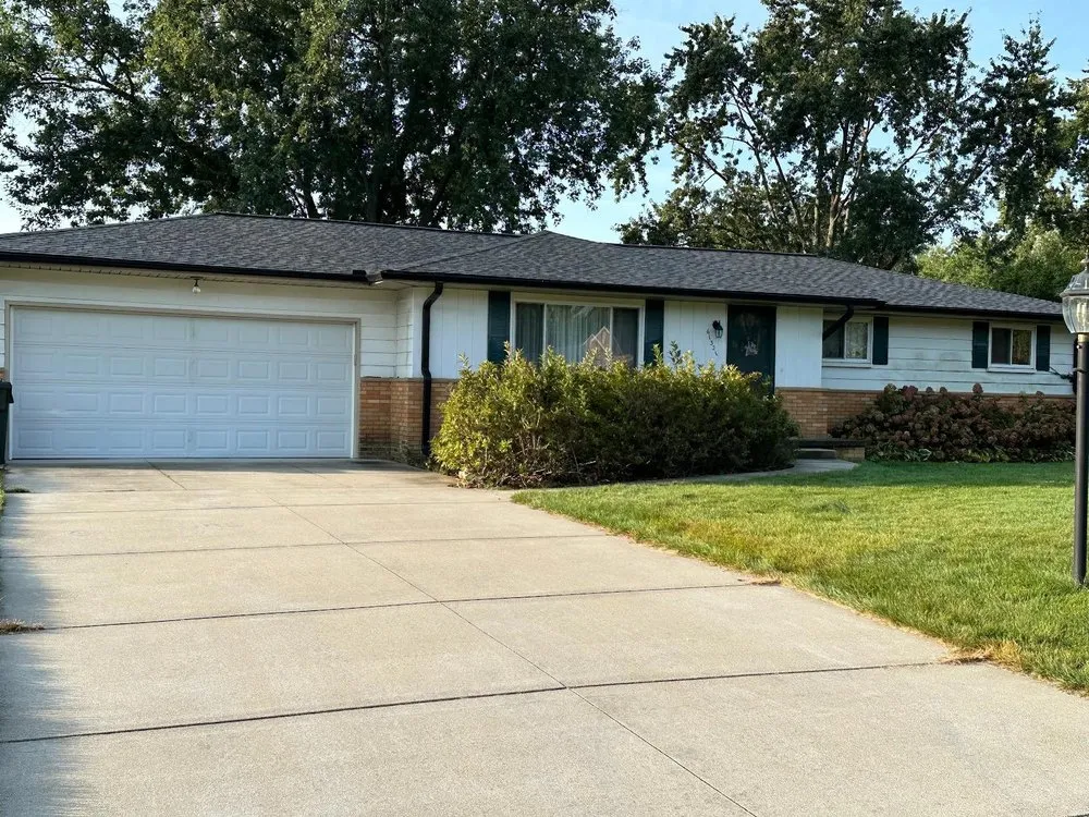 Slide of The Roof Company