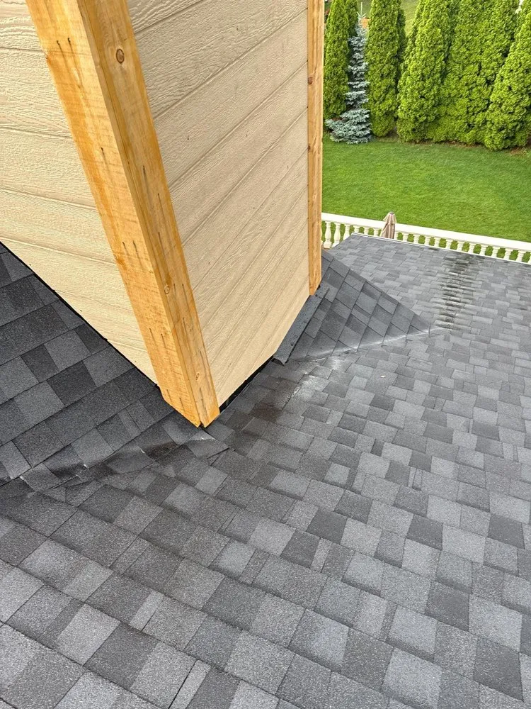 Slide of The Roof Company