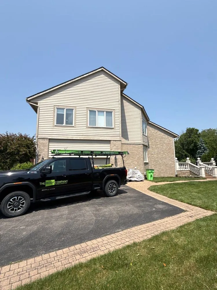 Slide of The Roof Company