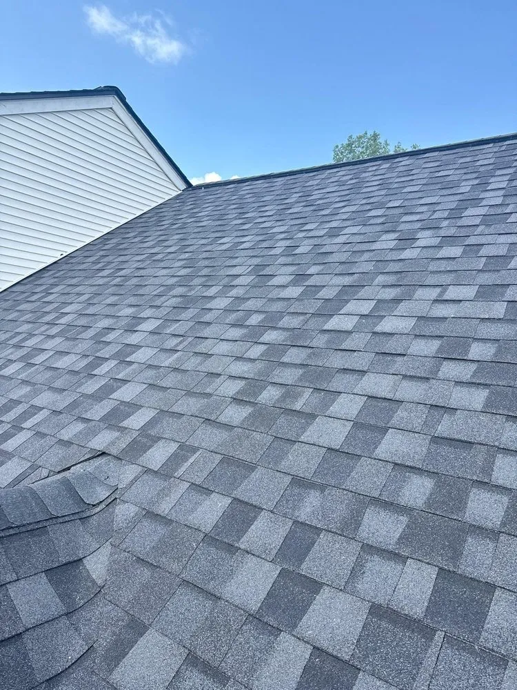 Slide of The Roof Company