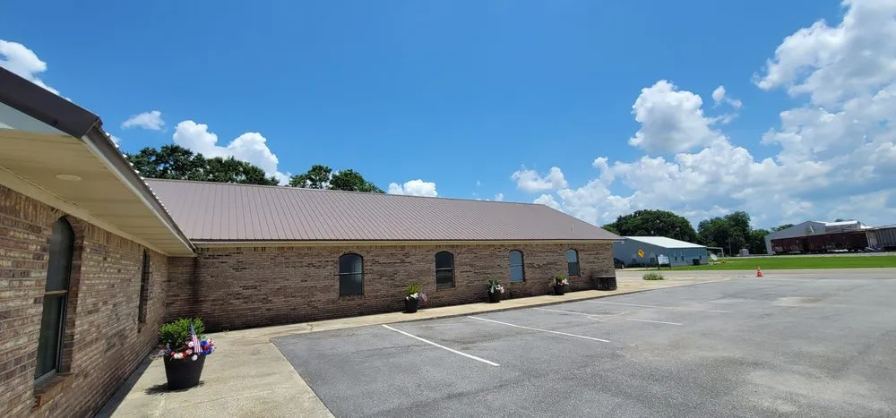 Slide of The Roof Company of NWFL