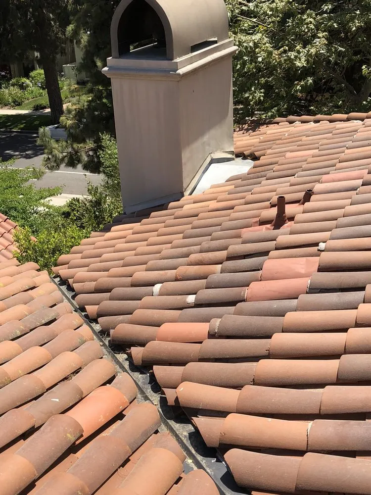 Slide of The Roof Experts