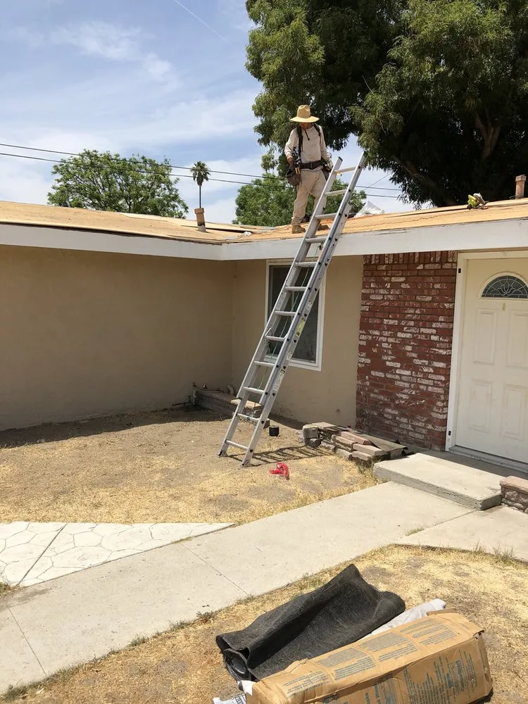 Slide of The Roof Experts