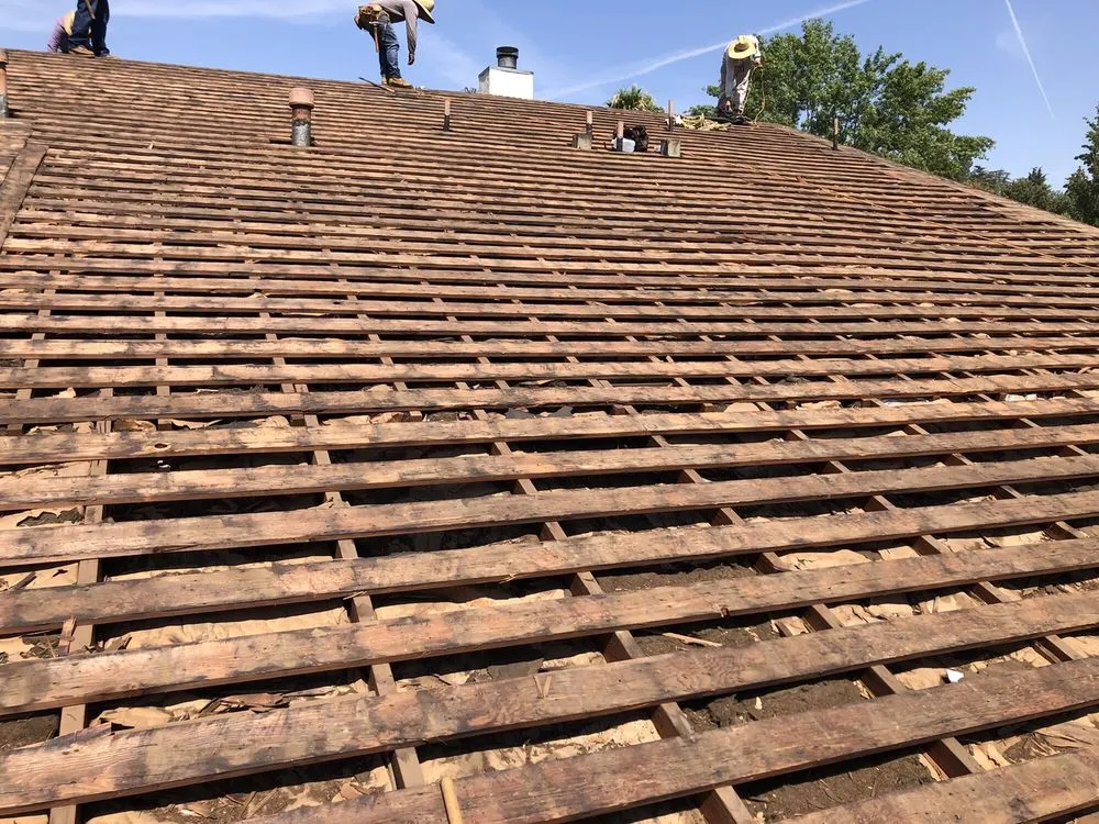 Slide of The Roof Experts