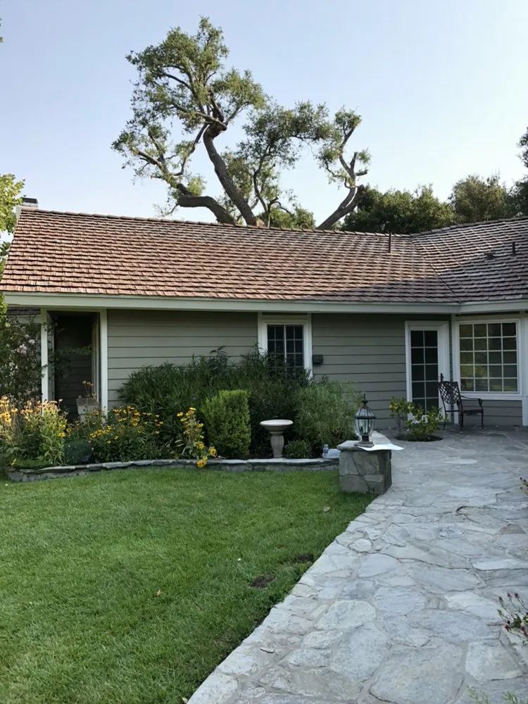 Slide of The Roof Experts