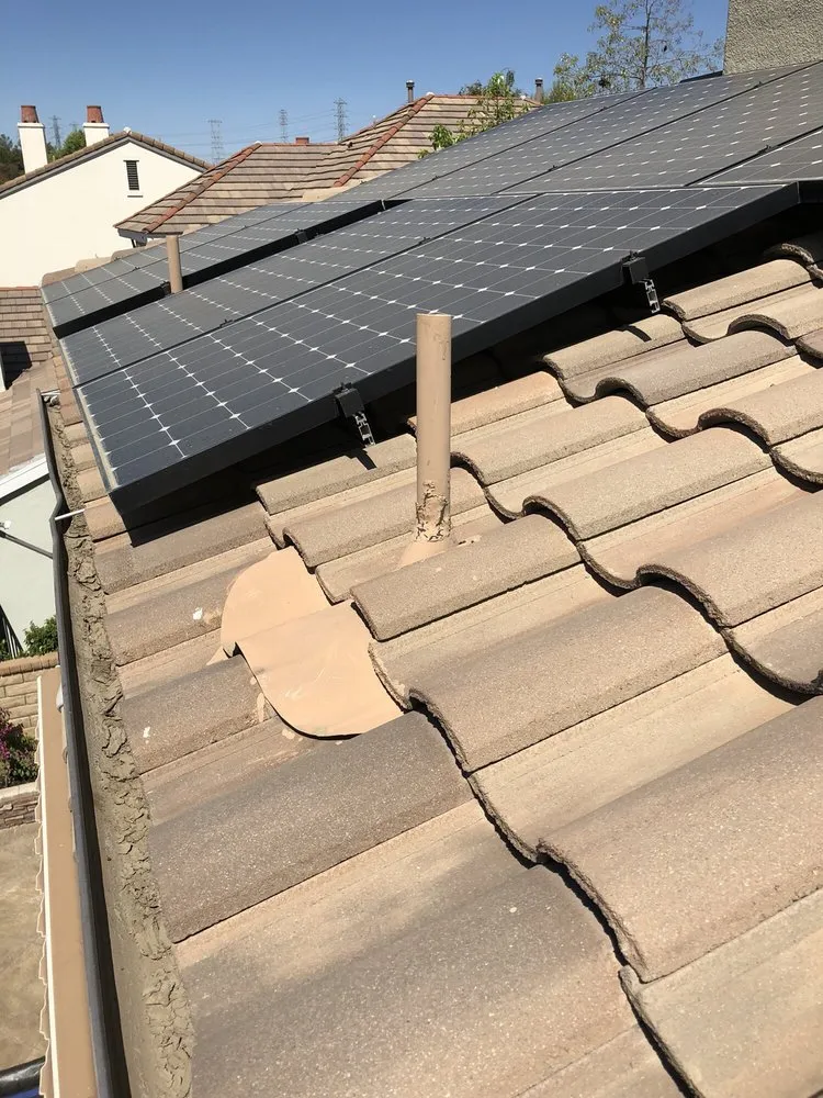 Slide of The Roof Experts