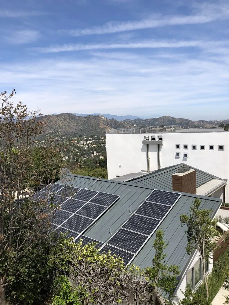 Slide of The Roof Experts