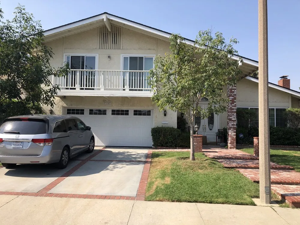 Slide of The Roof Experts