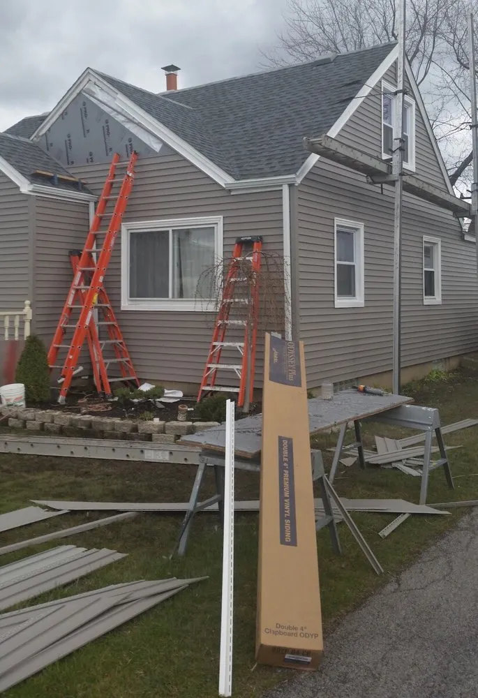 Slide of The Roof Geeks