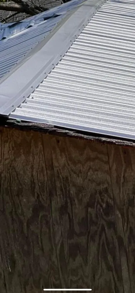 Slide of The Roof Guy