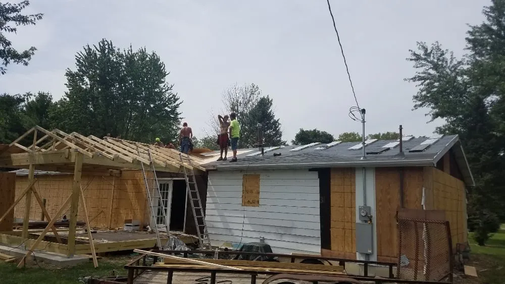 Slide of The Roof Guys