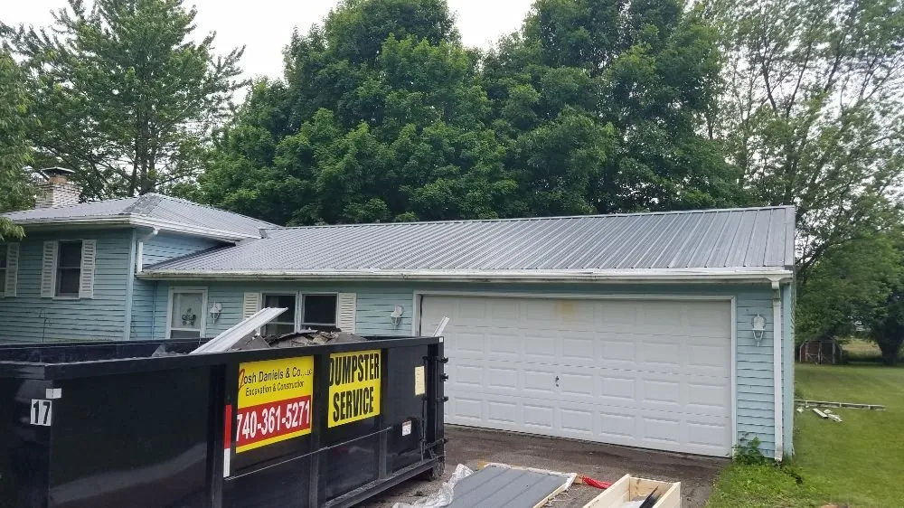 Slide of The Roof Guys