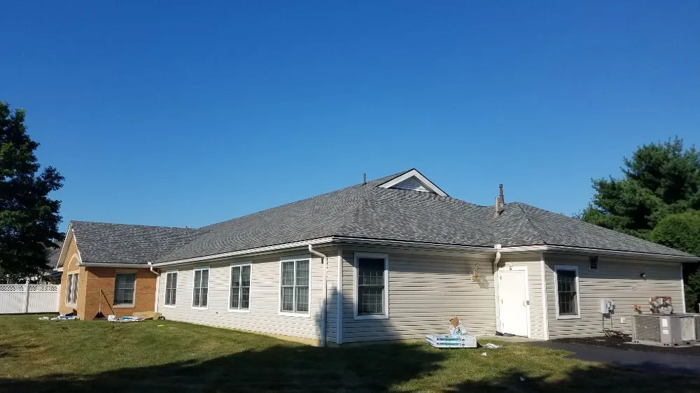 Slide of The Roof Guys