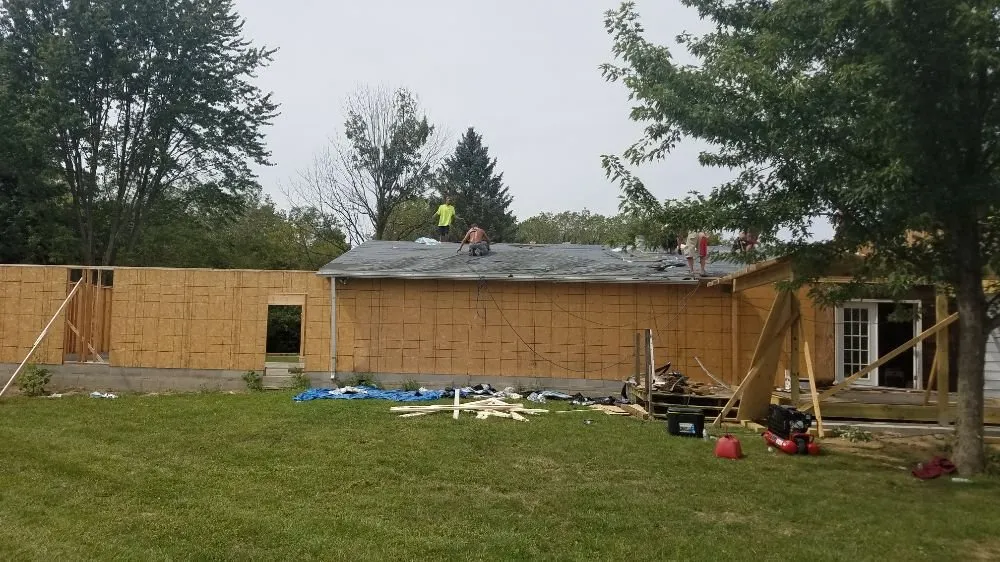 Slide of The Roof Guys