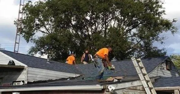 Slide of The Roof Guys