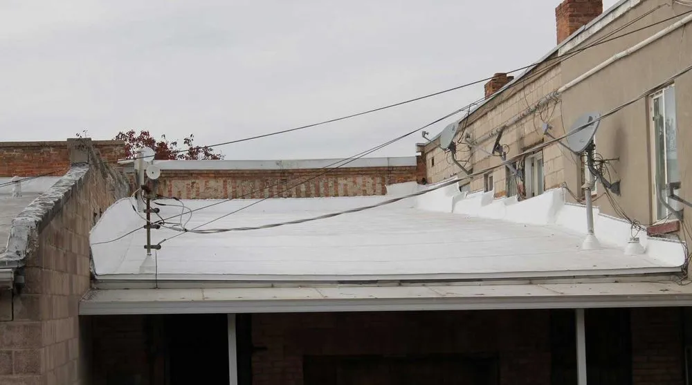 Slide of The Roof Guys Utah