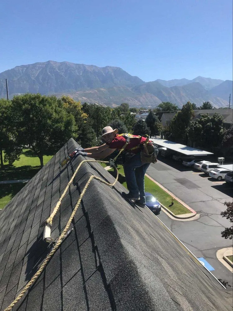 Slide of The Roof Guys Utah