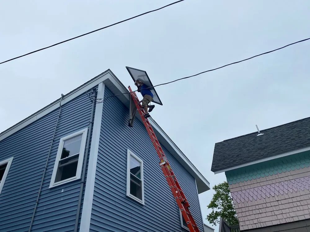 Slide of The Roof Kings