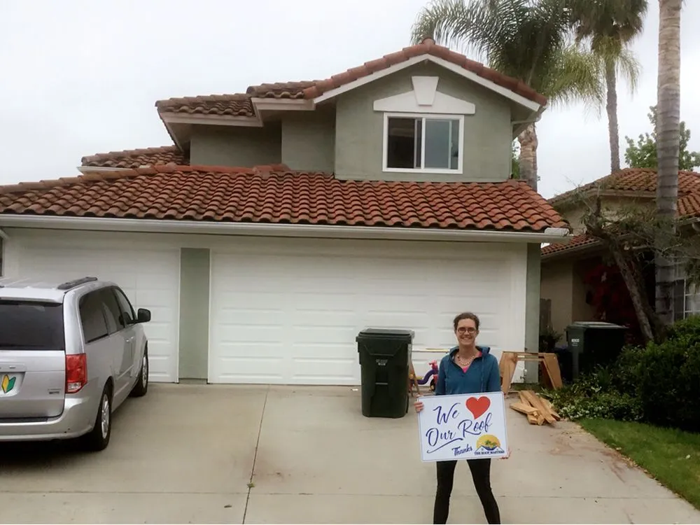 Slide of The Roof Masters