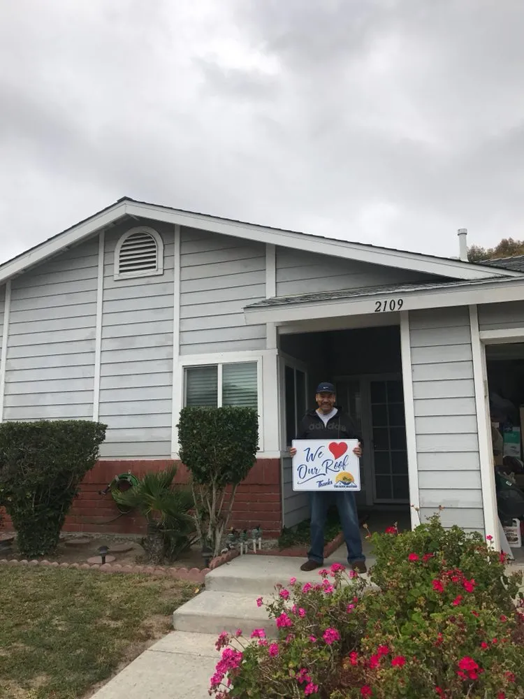 Slide of The Roof Masters