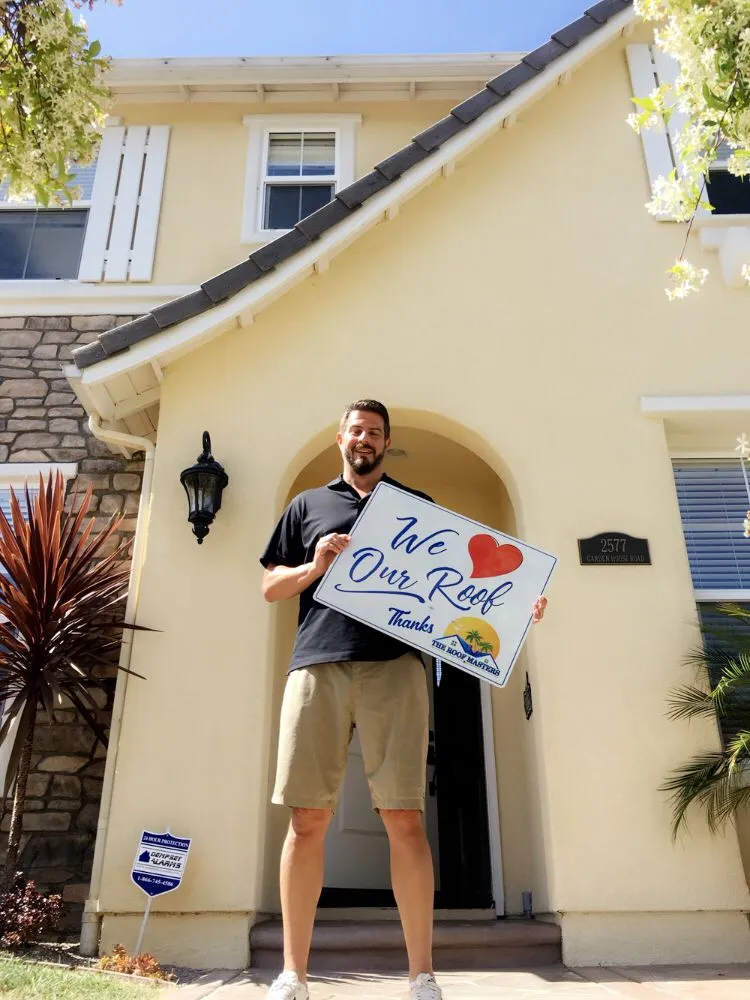 Slide of The Roof Masters