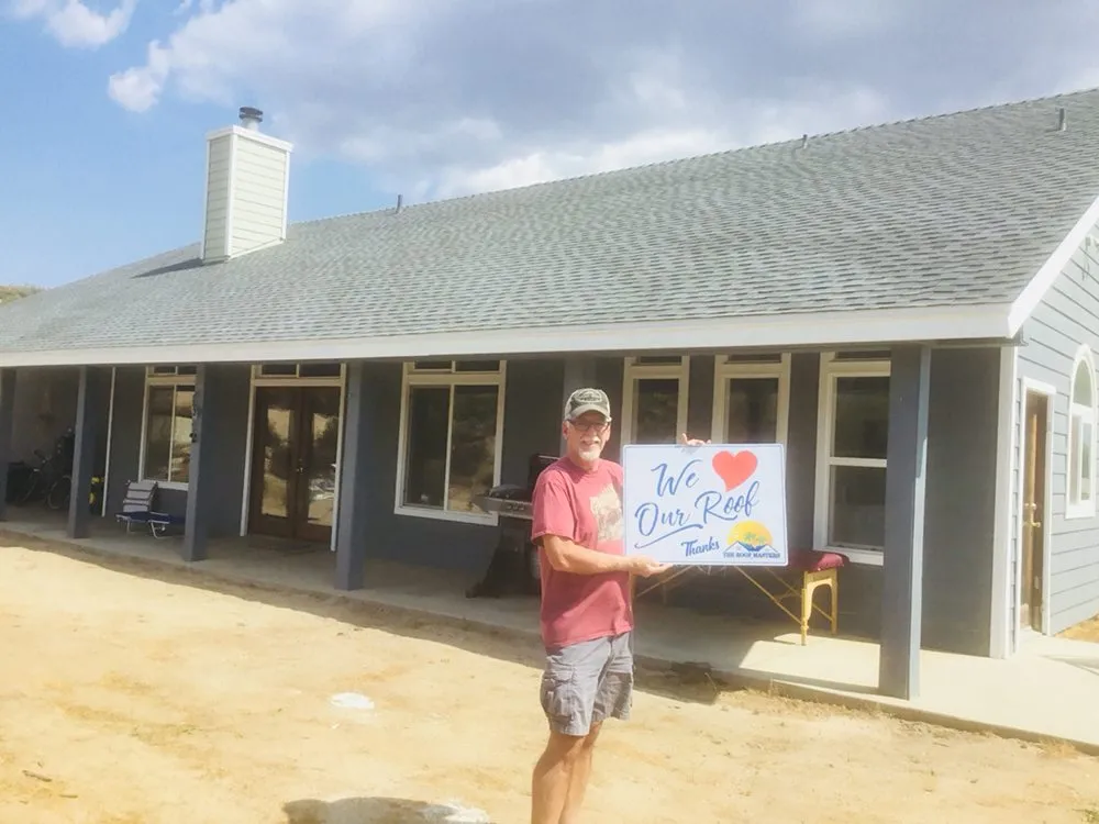 Slide of The Roof Masters