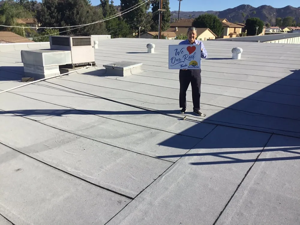 Slide of The Roof Masters