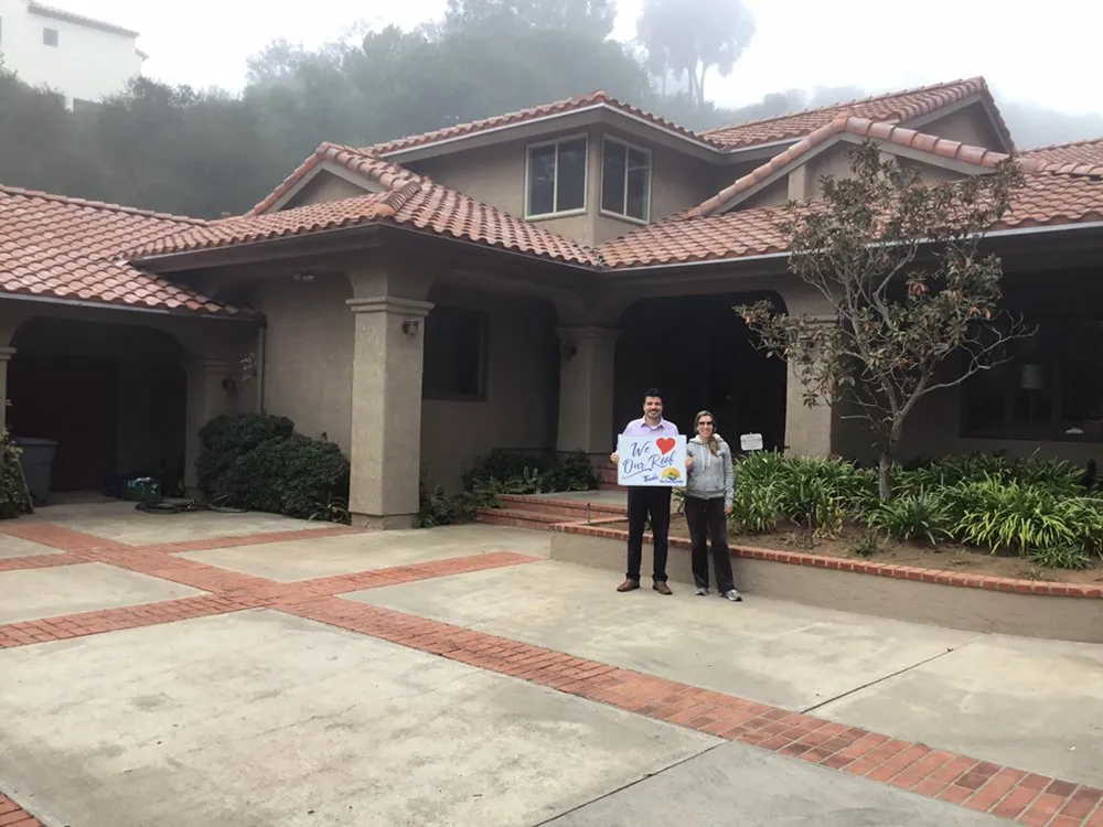 Slide of The Roof Masters