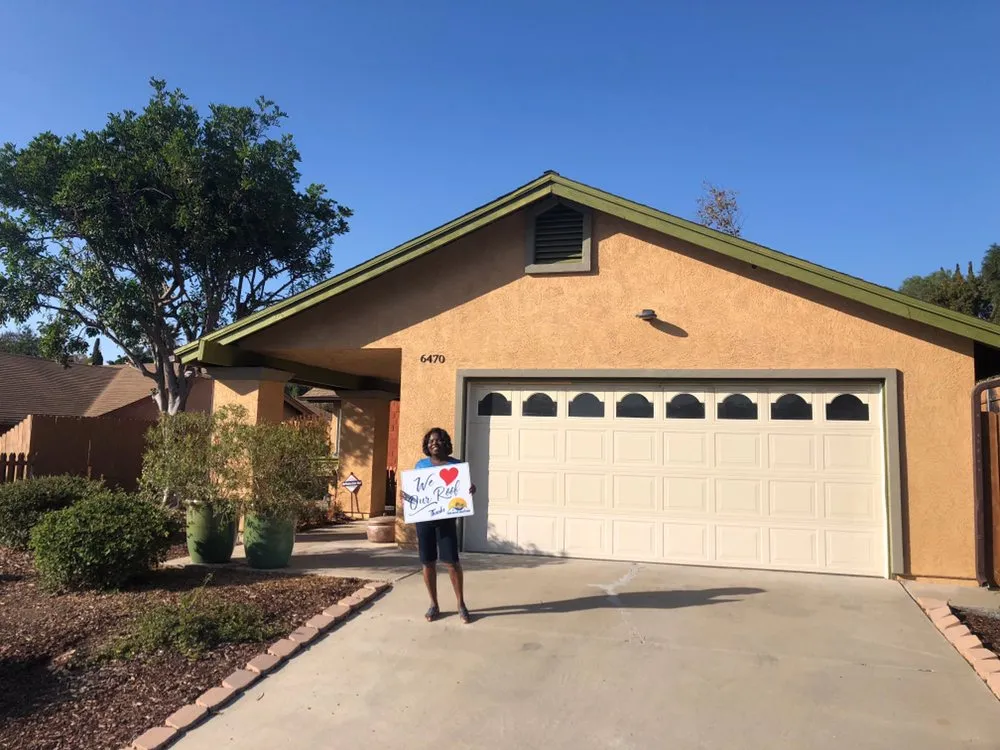 Slide of The Roof Masters