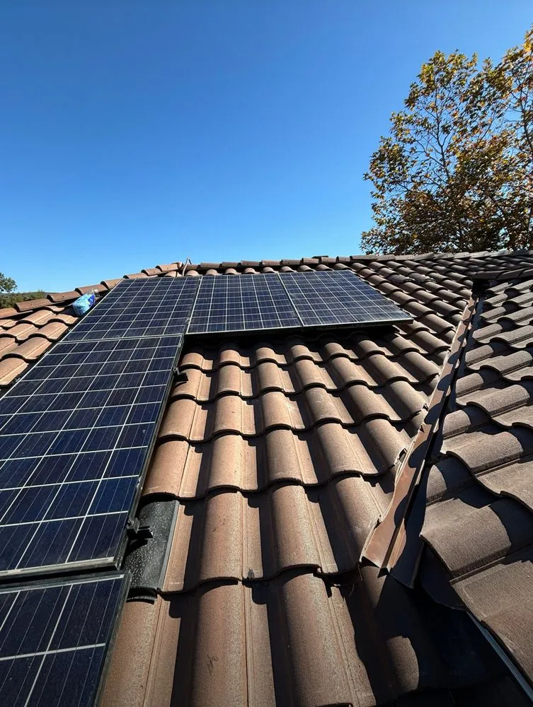 Slide of The Roof Masters