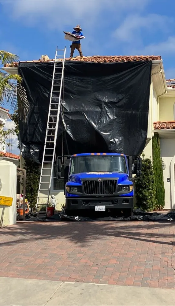 Slide of The Roof Masters