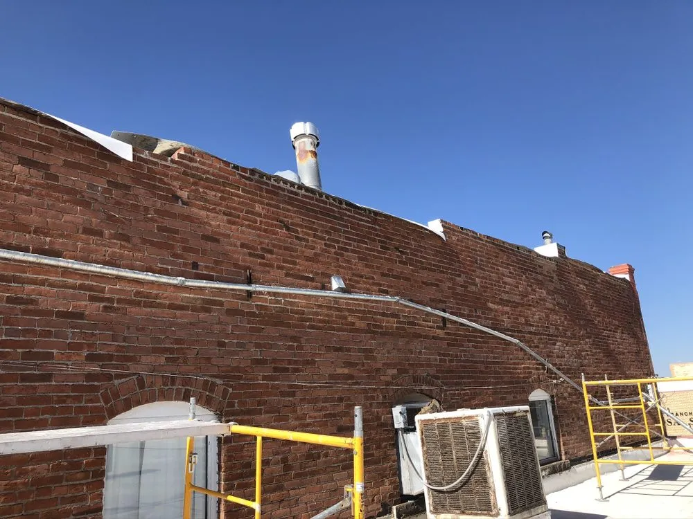 Slide of The Roof Medic