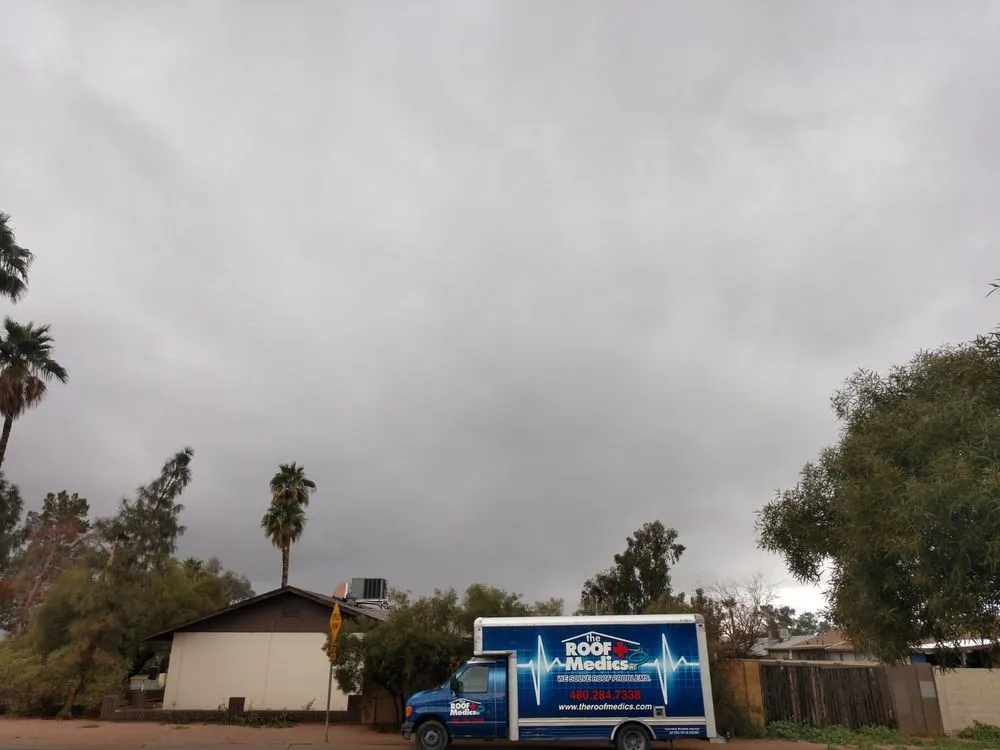 Slide of The Roof Medics