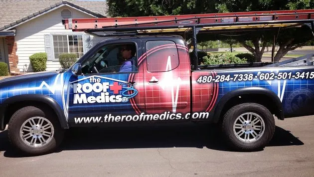 Slide of The Roof Medics