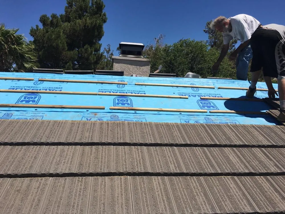 Slide of The Roof Repair Guy