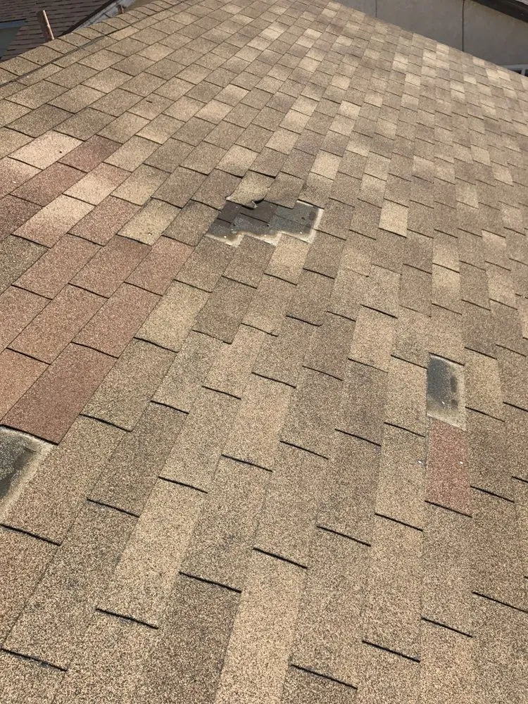 Slide of The Roof Repair Guy