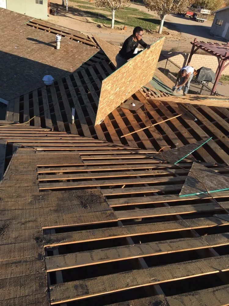 Slide of The Roof Repair Guy