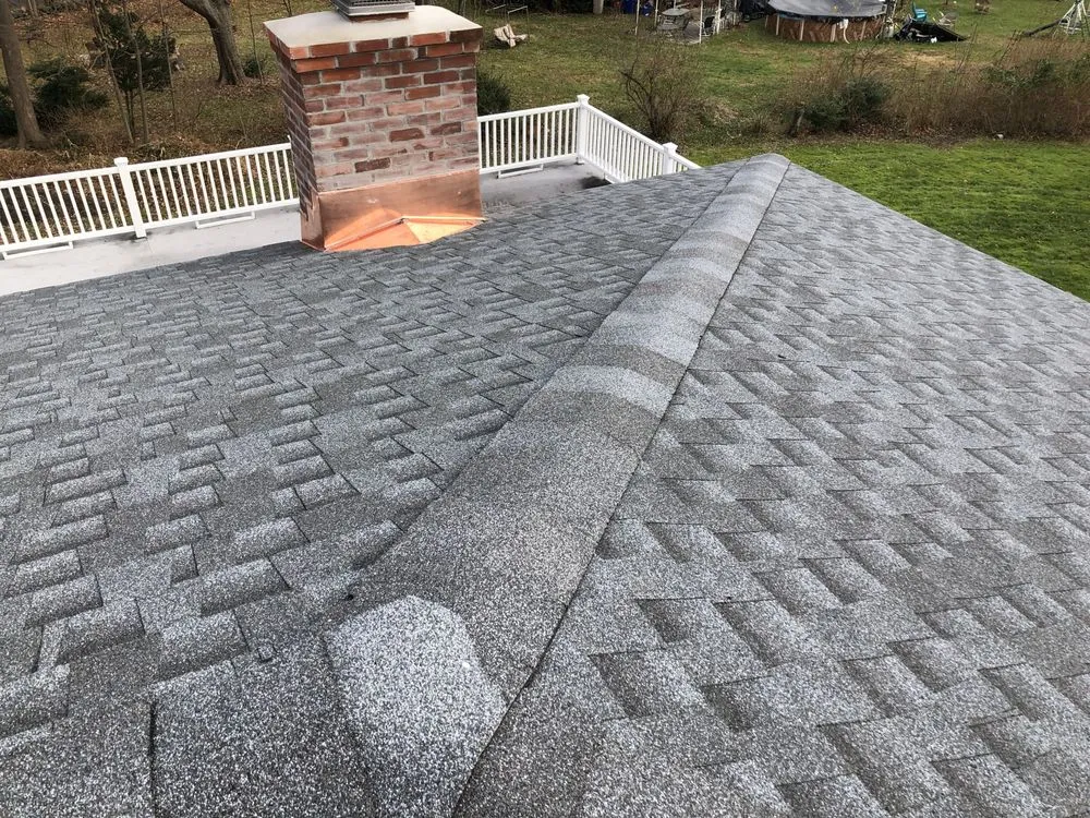 Slide of The Roof Specialist