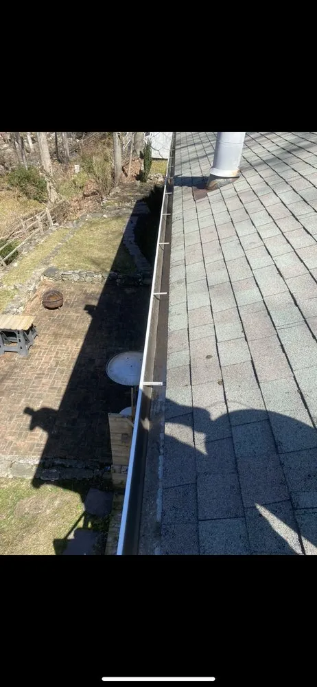 Slide of The Roof Specialist
